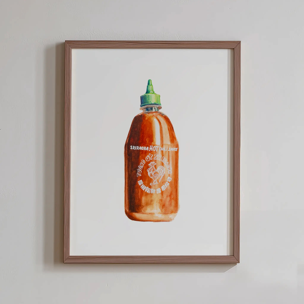 Framed artwork of a bottle of Tabasco hot sauce on a white background