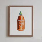 Framed artwork of a bottle of Tabasco hot sauce on a white background