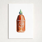 A minimalist art print depicting a watercolor illustration of a Sriracha hot sauce bottle, mounted on a textured white wall.