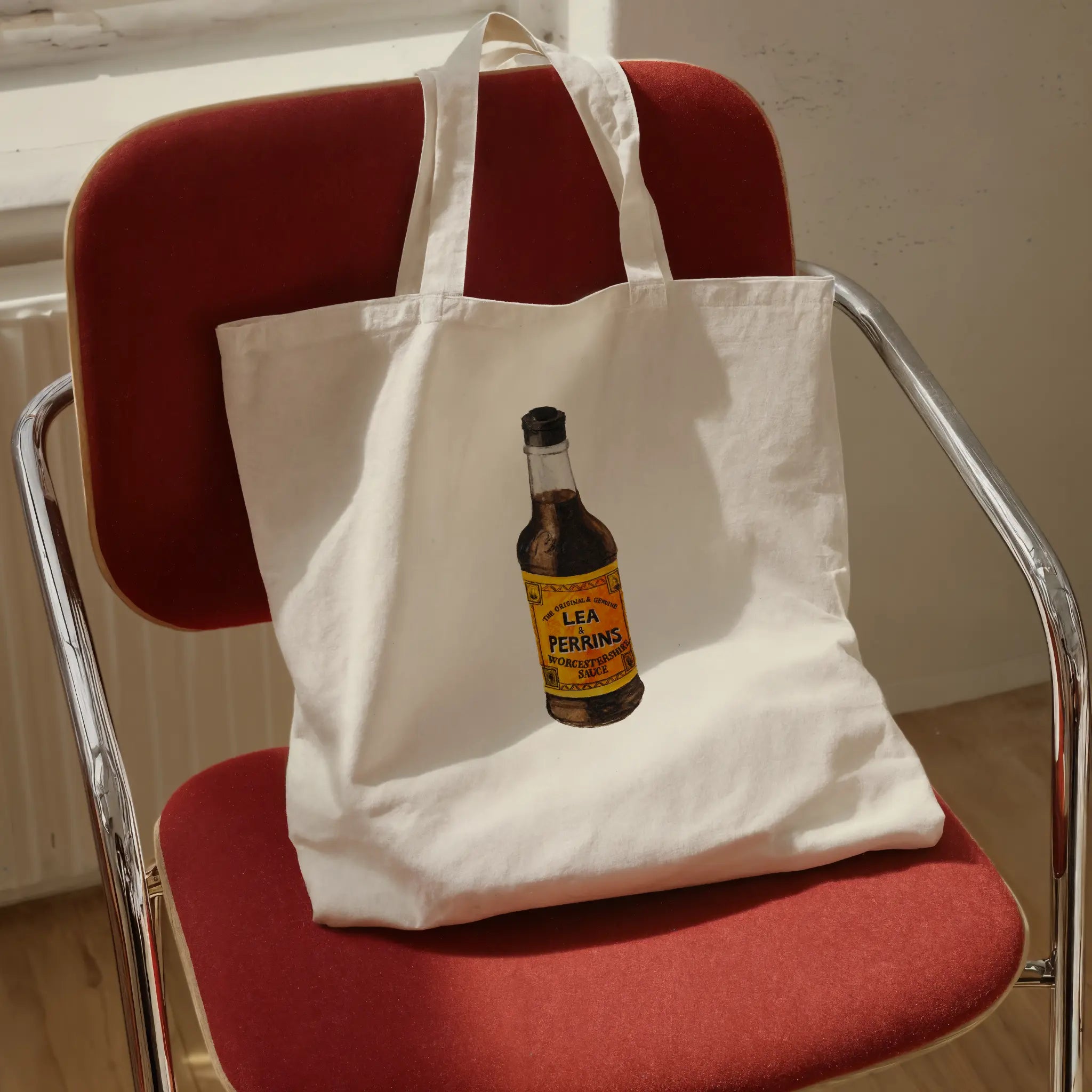 Lea & Perrins Worcestershire sauce original watercolor design cotton tote bag shown in flat lay product view